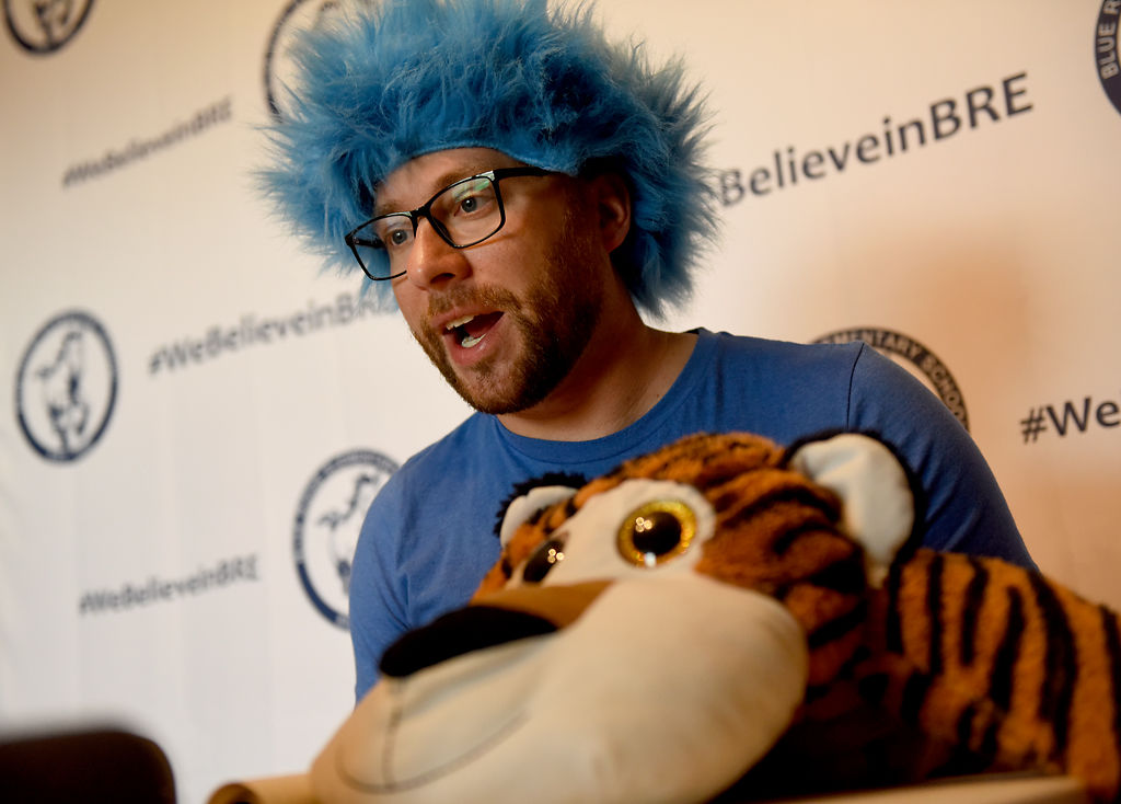 Blue Ridge principal Mark Burlison introduces ‘Bear’ the tiger during spirit week announcements